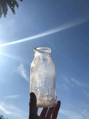 Antique Vintage Embossed Absolutely Pure Milk Glass Bottle